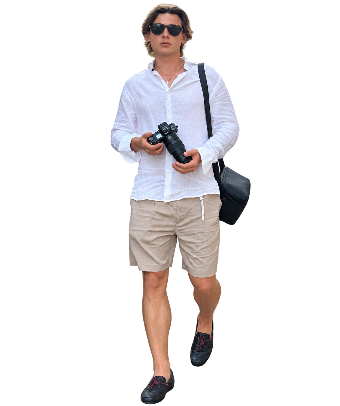 Nikita Piazenko holding his camera, ready to photograph a project