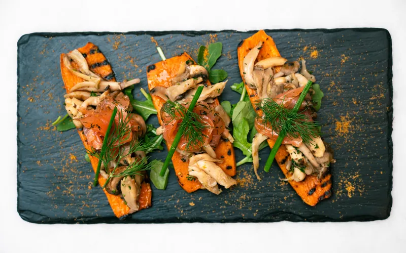 Bruschetta served on dark slate at Mare Fabris Osteria