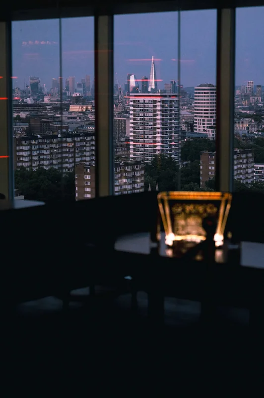 City skyline framed by the restaurant windows