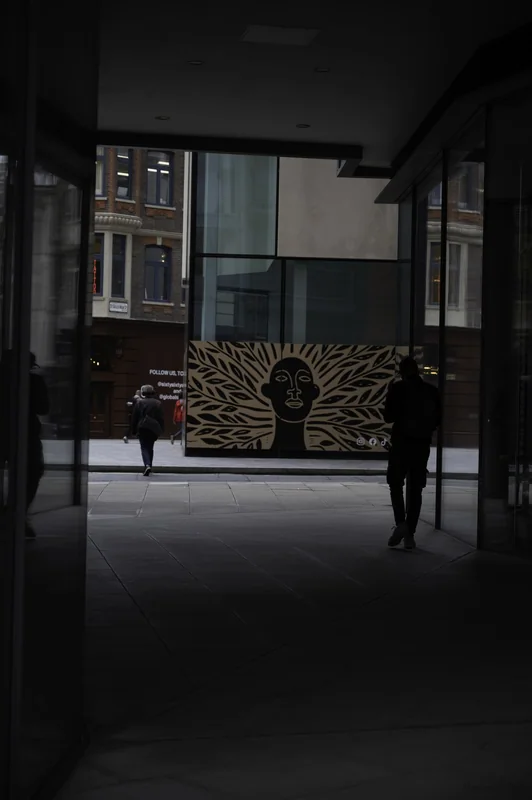 Corridor silhouette seen through dark framing