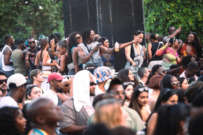 Dancers beside the festival stage