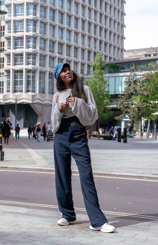Fashion portrait beneath modern London architecture