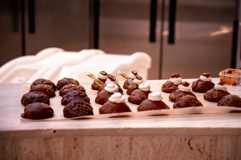 Finished pastries arranged on the pale café counter at COODIE