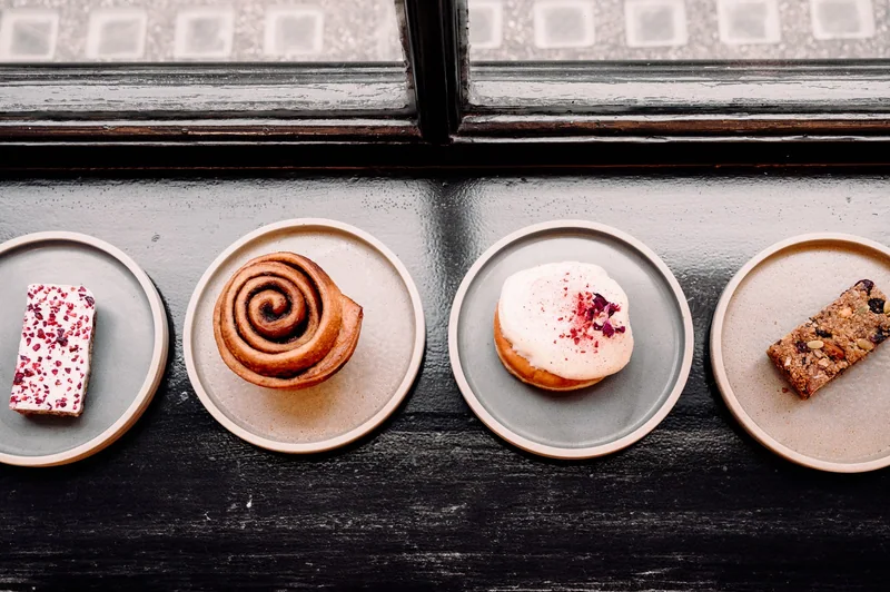 Four plate lineup with editorial overhead geometry