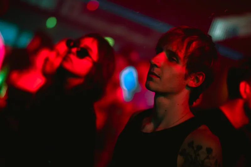 Guest looking toward the lights at Gallery 1986 in Vilnius