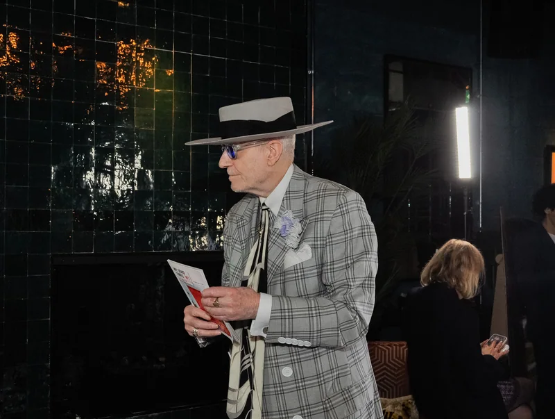Guest reading the magazine at the launch