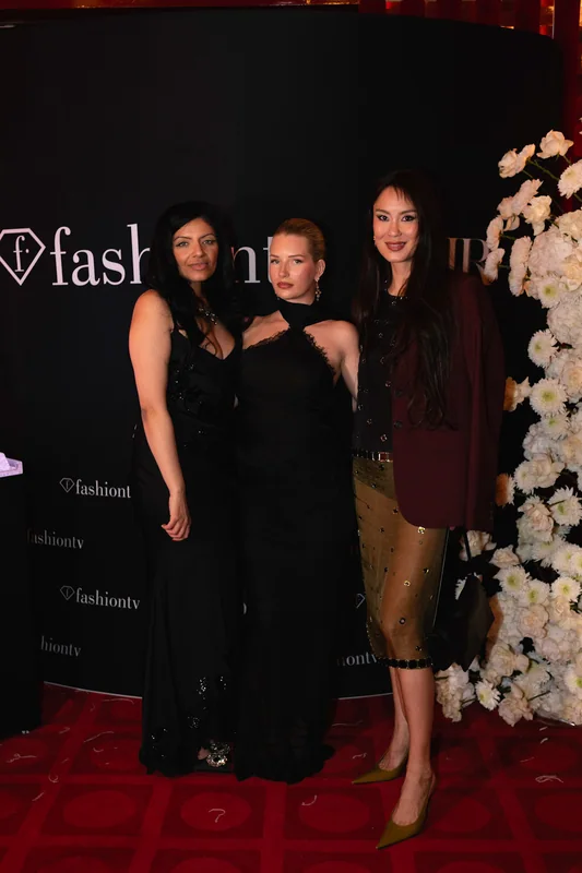 Guests gathered for a photograph at FashionTV