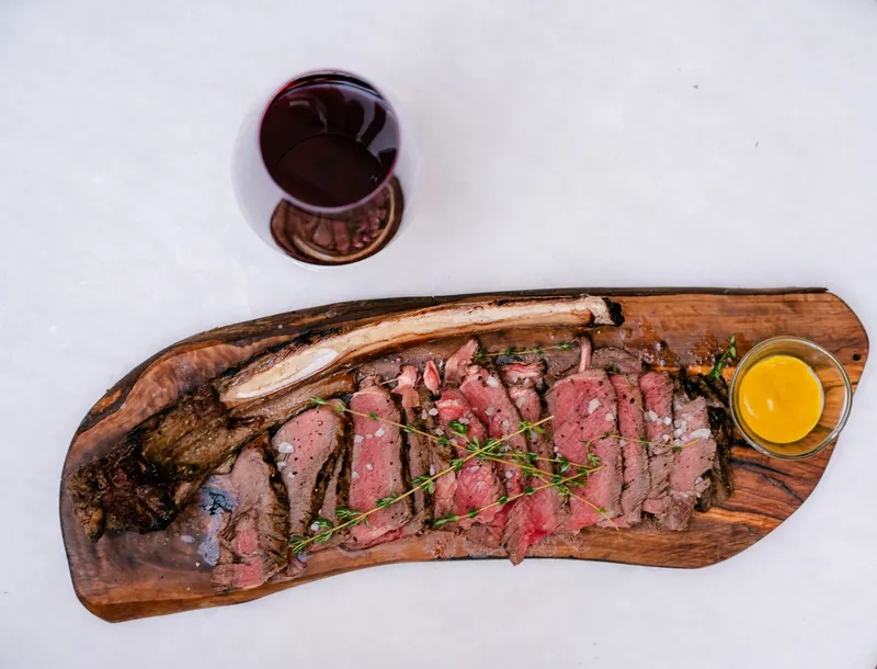 Sliced steak photographed from above at Mare Fabris Osteria